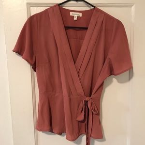 Blush wrap over blouse